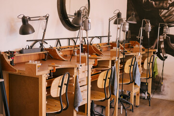 Workshop workbench jewelry tools lamps stools studio benches wooden workstations with task lighting seating small drawers for craft repair and precise metal work and stone setting