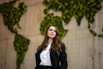 Fototapeta premium Young businesswoman envisioning global business growth