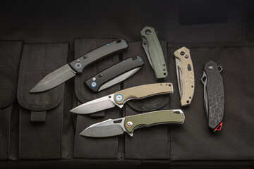 Assorted collection of modern folding EDC knives.