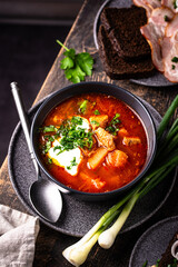 Traditional Ukrainian borsch with sour cream
