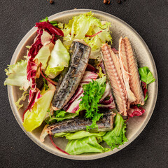 Mackerel salad canned fish, lettuce leaves tasty snack fresh delicious gourmet food table setting rustic food top view copy space keto and paleo diet vegetarian and vegan food pescetarian diet