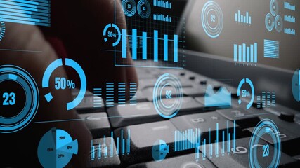 A close-up view of hands typing on a keyboard surrounded by digital graphs and analytics representing data visualization in a modern workspace. Xenic - Powered by Adobe