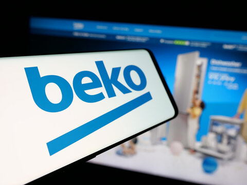 Stuttgart, Germany - 11-19-2025: Smartphone with logo of Turkish electronics company Beko Elektronik on screen in front of website. Focus on center-left of phone display.