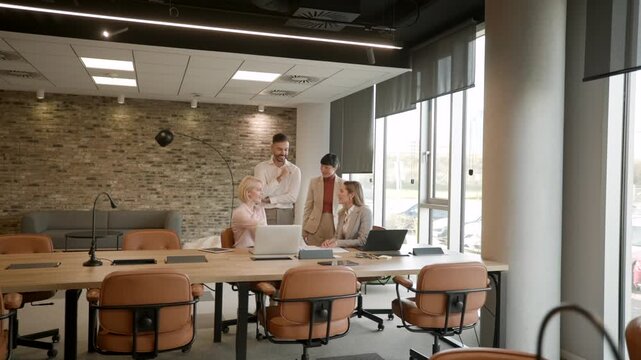 Team members collaborate on a project in a modern workspace during the afternoon