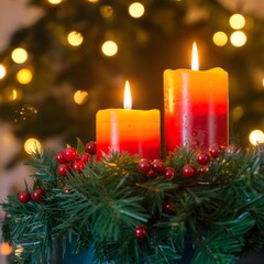 Cozy holiday glow from vibrant candles and festive greenery perfect for creating a warm, inviting Christmas atmosphere this winter season