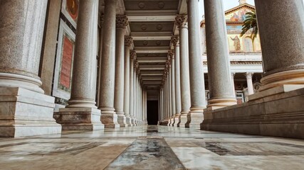 The quadriporticus of the Basilica of Saint Paul Outside the Walls or Basilica di San Paolo fuori le Mura in Rome, Italy - Powered by Adobe