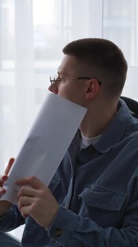 A boss reads resumes of job candidates.
Office recruitment.
Resumes and vacancies.
Business and employment concepts.
Job, office, personnel, department, selection, candidate