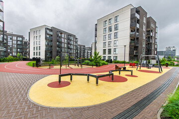 Modern Apartment Complex with Recreational and Outdoor Amenities