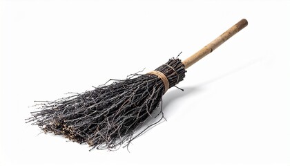"Traditional twig broom with wooden handle on white background."