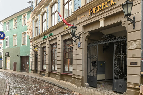 Riga, Latvia 01/12/2022 Sherlock Art Hotel and Alus seta Pub in Old Riga, Latvia
