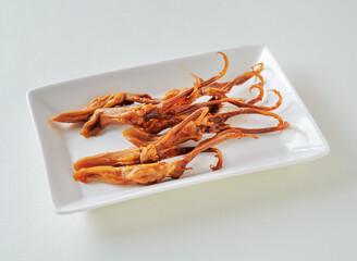 Tender duck tongues, perfect for showcasing exotic cuisine and tantalizing Asian culinary experiences.