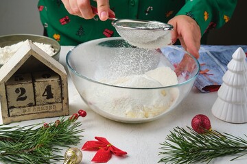 Step-by-step preparation of Candy Cane shortbread cookies in Christmas decor on a light concrete background. Merry Christmas! Traditional Christmas treats