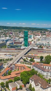 flight over zurich city traffic railway central station bridge aerial vertical panorama 4k timelapse switzerland 