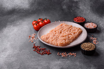 Raw ground chicken for burgers and other food. Raw minced chicken meat