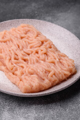 Raw ground chicken for burgers and other food. Raw minced chicken meat