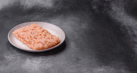 Raw ground chicken for burgers and other food. Raw minced chicken meat