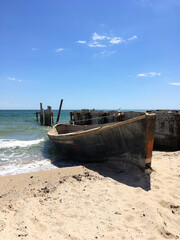 Old fishing boat on the seashore