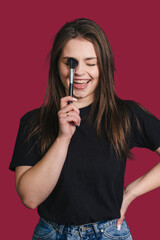 Fototapeta premium female demonstrating mascara application technique for beauty campaign and tutorial purposes