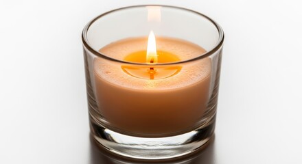 Scented candle burning in a glass holder on white background  