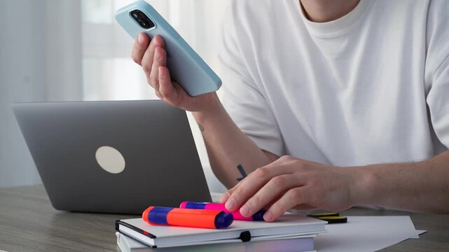 Typing on a touchscreen smartphone before sending.
A freelancer works remotely from home and writes an important message to a client.
Online correspondence with a client.
Internet, device, freelancer