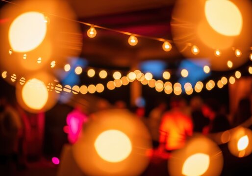 Warm bokeh lights illuminate a festive outdoor gathering at night