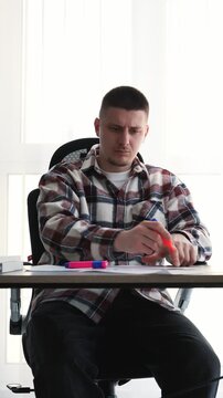 Correcting errors in paper documents with a marker.
Editing text and highlighting important information with a highlighter.
A person at a desk using a colored highlighter.
Work, marker, proofreading