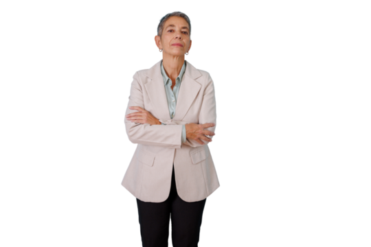 Mature confident business woman standing with arms crossed, portraying professionalism and leadership with a transparent background