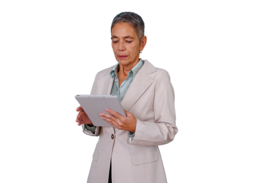 Senior businesswoman using a digital tablet, embodying experience and modern technology in a corporate setting. Transparent background
