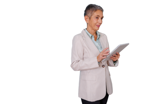 Senior businesswoman working with digital tablet, standing and smiling, depicting modern technology in business, transparent background