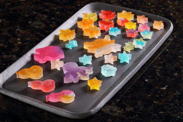 Kohakutō is a wagashi made from crystallized kanten. Kohaku means amber, jewel, and tō means sugar, so it's a jewel made of sugar. It's a sweet meant to be enjoyed with all five senses: touch, sight, 