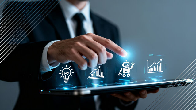 Businessman touches glowing icons representing innovation, data, and technology on a tablet. Contemporary office backdrop creates a professional atmosphere