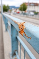 Cracked metal guardrail on highway