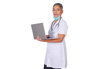 Senior woman doctor wearing white scrubs and stethoscope, holding a laptop, working on digital healthcare data with transparent background