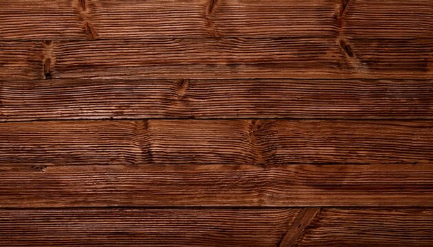 surface of a brown mahogany parquet laminate wood wall wooden plank board texture background with grains and structures