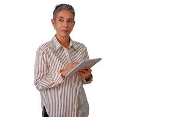 Mature woman standing, using a digital tablet for business tasks, working with technology, transparent background