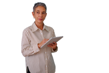 Mature woman standing, using a digital tablet for business tasks, working with technology, transparent background
