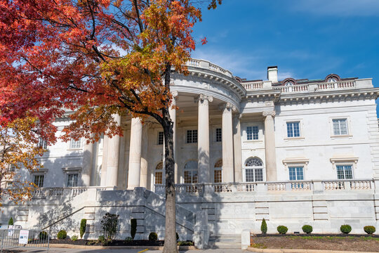 Bright fall trees framing classical architecture in central Washington DC