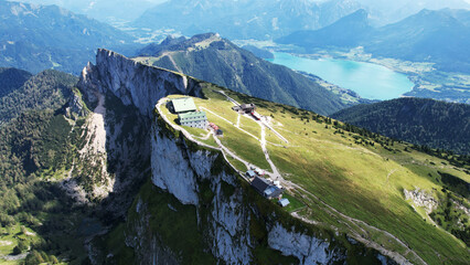 Dramatic Alpine ridge with mountain huts overlooking turquoise lakes in Austria