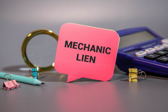 Guarantor.Magnifying glass showing the words.Background of banknotes and coins.