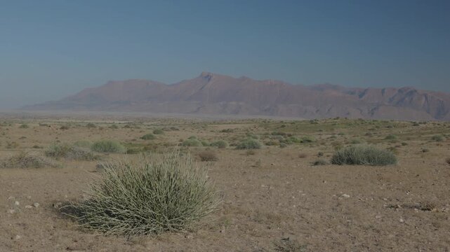 a morning zoom in shot of the brandberg massif in namibia, africa