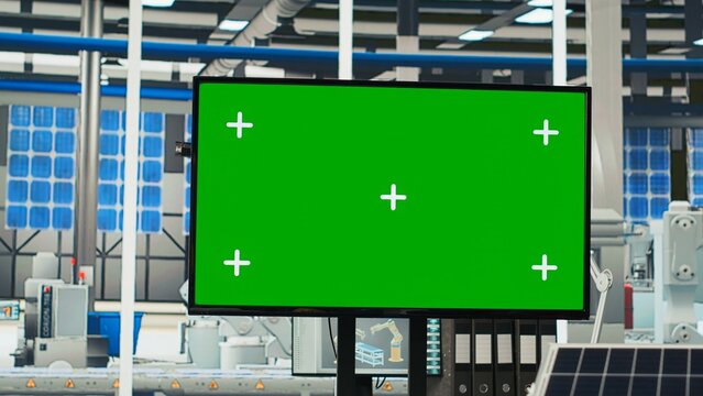 Isolated screen display used to adjust photovoltaics factory system parameters. Chroma key monitor in office used for optimizing energy supply in solar panel manufacturing plant