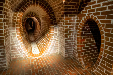 Fototapeta premium Exploration of Warsaw’s sewer system highlighting underground passageways and pipes