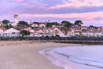 Gardinen Lila Saint-Jean-de-Luz Basque Country France Coastal Scenery with houses, beach and pier at dawn  © VeugerStock