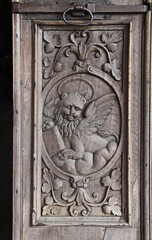 leone, simbolo dell'evangelista Marco; riquadro del portoncino scolpito dell'abbazia di Abbadia Cerreto