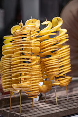 Spiral potato twisters or Tornado Potato, Christmas market, Zurich, Switzerland