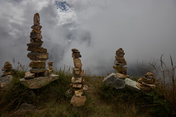 Steps of gratitude and connection.These apachetas, stone cairns built by trekkers, honor the Pachamama (Mother Earth). Each stone represents a moment, a wish, or a blessing left behind on the journey 