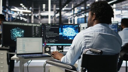 Server hub programmer with paraplegia in wheelchair uses AI machine learning node tree software. Man with disability in inclusive data center analyzes equipment issues using AI visualization, camera A