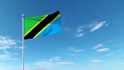 Tanzanian flag waving proudly against a clear blue sky on Flag Day celebration