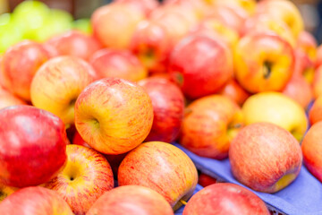 Background of red apples for sale.