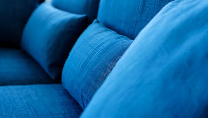 Obraz premium Close up blue sofa cushions provide comfortable seating concept idea